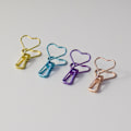 Miniatyrbillede 4 af 5: 4 stk./sæt Udhullet Design Metal Binder Clip Lange Hale Clips Kontor Hånd Bog Folder Papir Organizer Stationery Fisk Clip