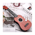 Miniatyrbild 1 av 5: Gitarrleksak Barn Simulation Musik Gitarr Instrument Mini Fyra Strängar Kan Spelas För Tidigt