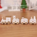 Miniatyrbilde 7 av 8: Juledekorasjoner Jul Tretog Barnas barnehage Ferie Julegaver Juledekorasjon Gaver White Train