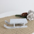 Miniatyrbillede 1 af 11: A Lot Decoration - juledekoration Kælk i træ 2,5 cm white