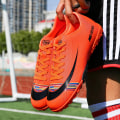 Miniatyrbild 5 av 5: Fotbollsskor för män Halkfria fotbollsskor Klossar Gräs Fotbollssneakers M9065 Orange 35