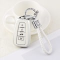 Miniatyrbillede 8 af 8: Nøglebeskyttelsescover til Toyota Camry RAV4 Corolla C-HR Avalon Highlander Prius Smart Keys Case Shell Protector Bling Keychain Tilbehør 4 Knapper TPU