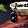 Pikkukuva 2 / 4: Obsidian-kaulakoru, luonnonkivinen amuletti, hyvinvoinnin ja vaurauden jalokivikoru miehille ja naisille