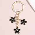 Miniatyrbillede 2 af 3: IC Blomster Charms Emaljeret Nøglering Søde Blomster Kæde Tassel Nøglering Gaver Håndtaske Taske Tilbehør