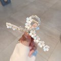 Pikkukuva 4 / 5: IC blomma stort grepp klämma n temperament elegant hårnål baksidan av th