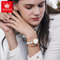 Miniatyrbild 3 av 6: OLEVS Quartz högkvalitativa klockor för kvinnor Keramiskt band Vattentätt mode damarmbandsur Uppgraderingsversion med krona white