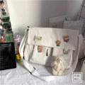 Miniatyrbild 1 av 6: Canvasväska Enkel Kvinnor Crossbody-väska Ungdom Flickväskor Damväskor Casual Axelväskor Diagonal Messenger Skolväskor Handväskor 4 badge pendants1 No Pendant