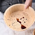 Miniatyrbillede 3 af 5: QU.200 stk. Air Fryer Bagepapir Non-Stick Engangs Air Fryer Bagepapir Kurv Uperforeret Rund Bagemåtte A