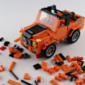 Miniatyrbild 3 av 4: QU/Klassisk kreativ programmeringslåda, bygg din egen leksak, barns byggsats, programmeringsjeepleksak - orange