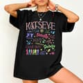 Miniatyrbilde 8 av 10: Katseye jentegruppe trykt T-skjorte, trendy kortermet sommertopp for menn og kvinner, oversized passform 2 M