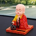 Soldriven Leksak Buddhistmunk Figur Dansande Gungande Figur Modell Leksak Instrumentbräda