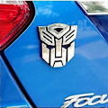 Pikkukuva 4 / 4: Autobot-autotarrat, pari, kromiviimeistely, PVC, autoembleemi, Transformers, autotarvikkeet