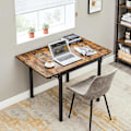 Miniatyrbillede 4 af 7: Rootz Vintage Brun-Sort Spisebord - Spånplade stål - Sammenklappeligt bord - Rustikt bord - Heavy Duty - 120cm x 78cm x 76,2cm