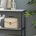 Miniatyrbillede 4 af 6: Rootz konsolbord - Industrielt design - Elegant imiteret marmor - 2 hylder - Marmoreffekt - Robust stålstel - Sort + Hvid - 100L x 30W x 80H cm