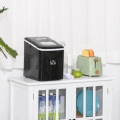 Miniatyrbild 2 av 5: Rootz Ice Cube Machine - 12kg/24h 2l Ice Cube Maker med LED-skärm - Ice Scoop - Självrengörande funktion - Plast - Svart - 21,2 x 29,5 x 32,6 cm