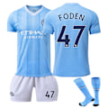 Pikkukuva 1 / 2: 23-24 Manchester City kotipeliasu aikuisille ja lapsille, sukat mukana, nro 47 Foden No. 47 Foden L