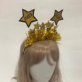 Miniatyrbilde 2 av 3: Kvinner Nyttår Glitter Femspiss Stjerneform Hårbøyle Performance Hårbøyle