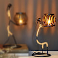 Miniatyrbild 4 av 4: Smidesjärnsljusstake, smidesjärnsljusstake i form av en liten flicka