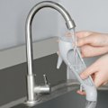 Pikkukuva 3 / 5: Veden säiliön täyttösuppilo espressokoneelle, pitkä suppilo nopeaan veden virtaukseen espressokoneelle, jossa veden säiliö on takana green