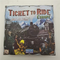 Miniatyrbillede 2 af 5: Engelsk og amerikansk version af Ticket To Ride Europe brætspil kort