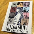 Pikkukuva 1 / 2: /HA/Taylor Swift THE ERAS TOUR Kuparilevy tekstikirja, tekstilehti Juliste