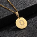 Miniatyrbild 1 av 5: Runda bokstavsamuletter i guld och zirkon guldpläterade halsband Gold one size