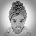 Miniatyrbillede 1 af 6: Sød turban med stor blomst flere farver stretchmateriale 0-4 år baby barn Grey one size
