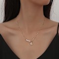 Pikkukuva 3 / 5: Kullattu kaulakoru enkeli numero 7 tarkoittaa hengellistä lahjaa Gold one size