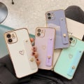 Pikkukuva 5 / 6: iPhone 13 Pro kotelo sydän- ja nilkkahihnalla kullanvärisillä yksityiskohdilla White one size
