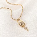 Miniatyrbilde 1 av 2: Gold-plated necklace chain with lock and key in rhinestones Gold one size