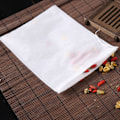 Miniatyrbillede 2 af 4: 200 stk. Teposer Teposer Træk Snor Engangs Non-woven Teposer Kinesisk Medicinposer Afkogningsposer Saltlageposer Fodbadposer Blomsterposer Sæson