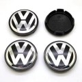 Miniatyrbillede 1 af 4: Sæt med fire 65 mm hjulkapsler til Volkswagen, VW Golf Passat Touran, en