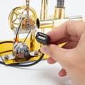 Miniatyrbild 4 av 8: Hot Air Stirling Engine Model Kit, DIY Metal Assembly Kit with Single Cylinder Stirling Engine and USB Lamp, Stirling Engine Building Kit Type 3 Type 3