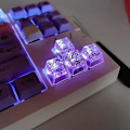 Pikkukuva 3 / 5: Taustavalaistu Keycap-hartsi Persoonallisuus Läpinäkyvä Hopeafolio OEM-profiili R4 Korkeus Vaaleanpunainen Keycap Pelikäyttöön