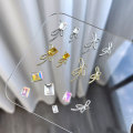 Pikkukuva 3 / 8: 10 kpl DIY Nail Art Decoration 3D Sliver / kultainen rusetti kynsipora 10Pcs Gold 7*18mm