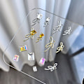 Pikkukuva 3 / 8: 10 kpl DIY Nail Art Decoration 3D Sliver / kultainen rusetti kynsipora 10Pcs Sliver 7*18mm