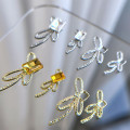 Pikkukuva 6 / 8: 10 kpl DIY Nail Art Decoration 3D Sliver / kultainen rusetti kynsipora 10Pcs Gold 7*18mm