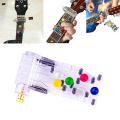 Miniatyrbild 3 av 3: Gitarr inlärnings hjälpmedel med färgade knappar