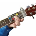 Miniatyrbillede 1 af 3: Hjælpemiddel til guitarindlæring med farvede knapper