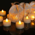Flameless LED Candles, 24 Flickering LED Tealights, Warm White Spotlights