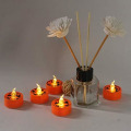 Miniatyrbilde 5 av 5: Halloween 12 stk Orange LED Teelys Gresskar Smilende Ansikt Trykk Varmt Hvit Flimrende Batteridrevet Flammeløse Lys for Hjemmedekor Jul