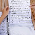 Miniatyrbild 2 av 5: Musikmapp för noter medan du spelar A4-pappersdokument Hållare Förvaring 30 fickor Notnyckel