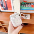Miniatyrbilde 2 av 5: Airpod 2/1 Silikonetui Tegneserie Smiley Støvbestandig Design