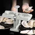 Miniatyrbillede 3 af 4: Dobbelt-hoved Automatisk Dumpling Maskine Husholdning Dobbelt Hoved Rustfrit Stål Manuel Dumpling Maker Form Lav Dumplings Empanadas