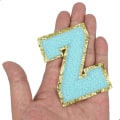 Pikkukuva 3 / 5: Englannin kirjaimen Z rauta-liimauskorjauslaastarit Aakkosten ompelutarrat Vaatteiden merkit, kultaisen glitterin reunalla, liimapintainen tarra (Sininen Z) ZSininen