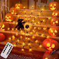 Miniatyrbillede 1 af 5: Halloween Edderkoppespind Lys 4FT Diameter 70 LED med Sort Edderkop, Vandtæt Orange Net Lys, Fjernbetjening, 8 Tilstande