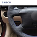Miniatyrbild 5 av 7: (Grå tråd)Handsömnad Svart PU rattkåpor i konstläder för Volkswagen VW Golf 4 IV Passat B5 Passat Variant Sharan Bora Gray Thread
