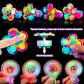 Miniatyrbild 2 av 4: 4-pack LED fingertoppsfärgningsringfest pop-snurror Gyro ring