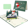 Miniatyrbild 1 av 5: 3D Pop Up Card Julkort, vackert jultomte gratulationskort med kuvert（ski）
