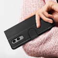 Pikkukuva 4 / 5: Kotelo OnePlus Nord CE4 Lite Flip Wallet -tukivideolle, musta Svart